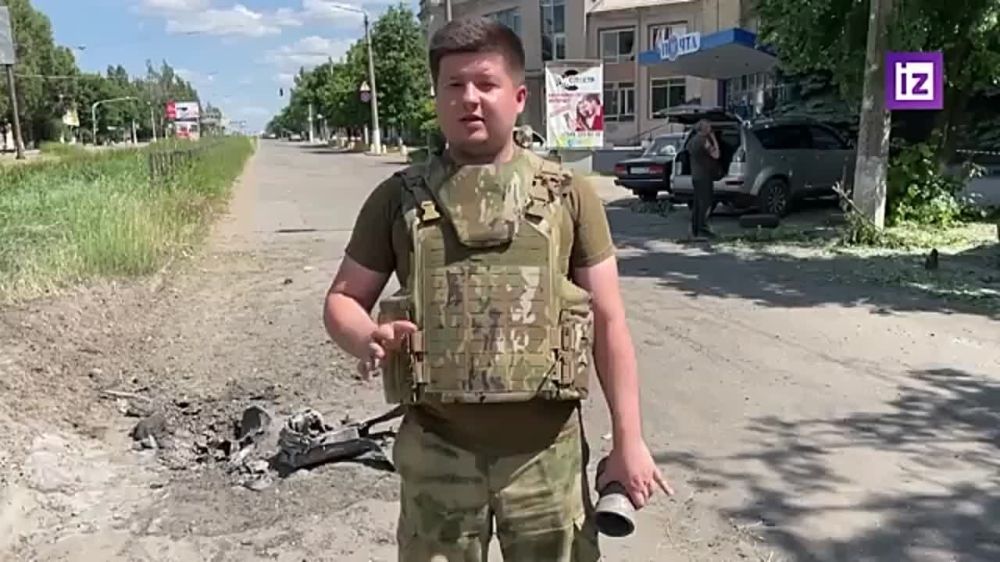 Последствия украинского обстрела Горловки показал корреспондент "Известий" Евгений Быковский