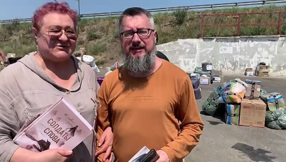 Председатель Союза журналистов Донецкой Народной Республики Виктор Петренко и председатель Томского областного отделения СЖР...