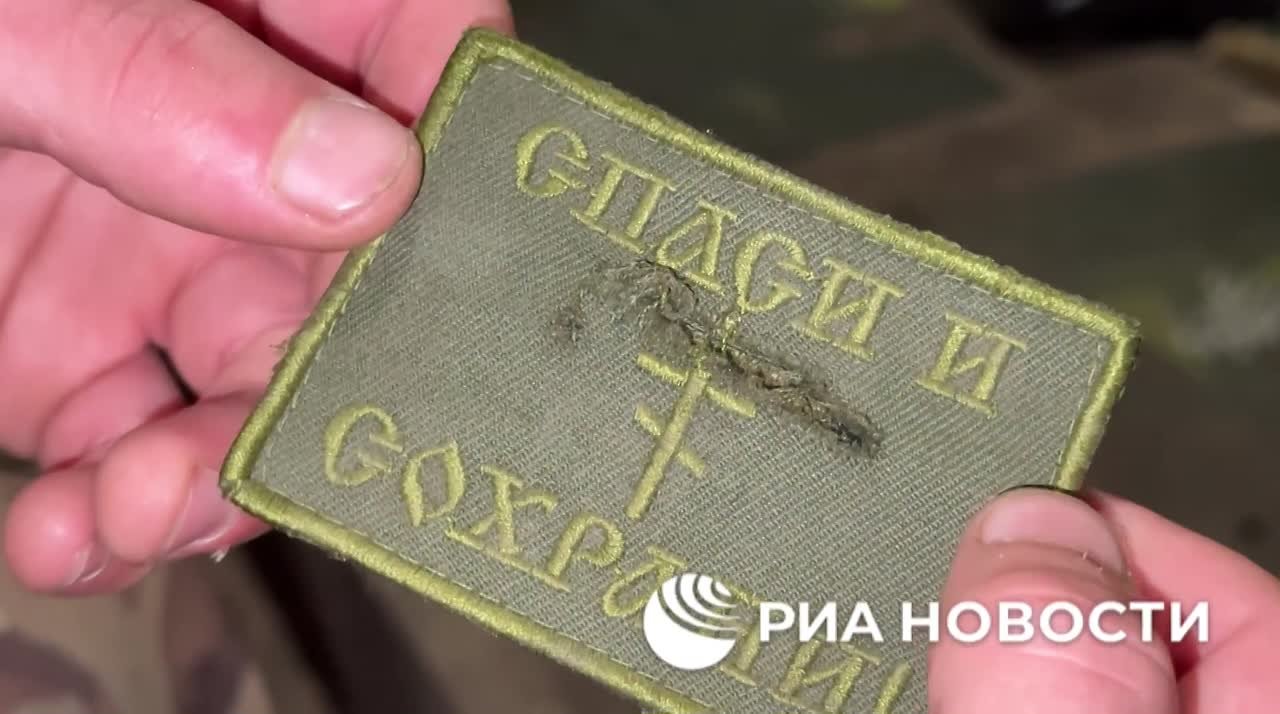 Шеврон "Спаси и сохрани" уберег российского морпеха при атаке дрона в ДНР