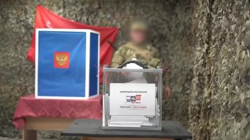 В ДНР росгвардейцы участвуют в досрочном голосовании за депутатов Госдумы